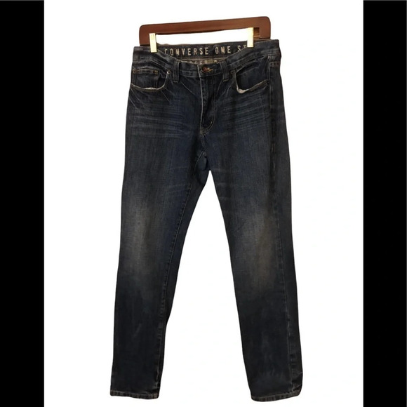 Distressed slim fit tapered jean - Picture 1 of 9